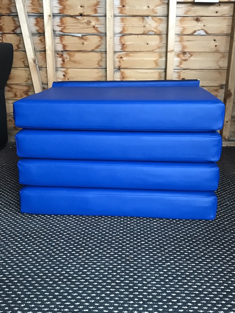 Blue vinyl boat cushions with zipped hinges