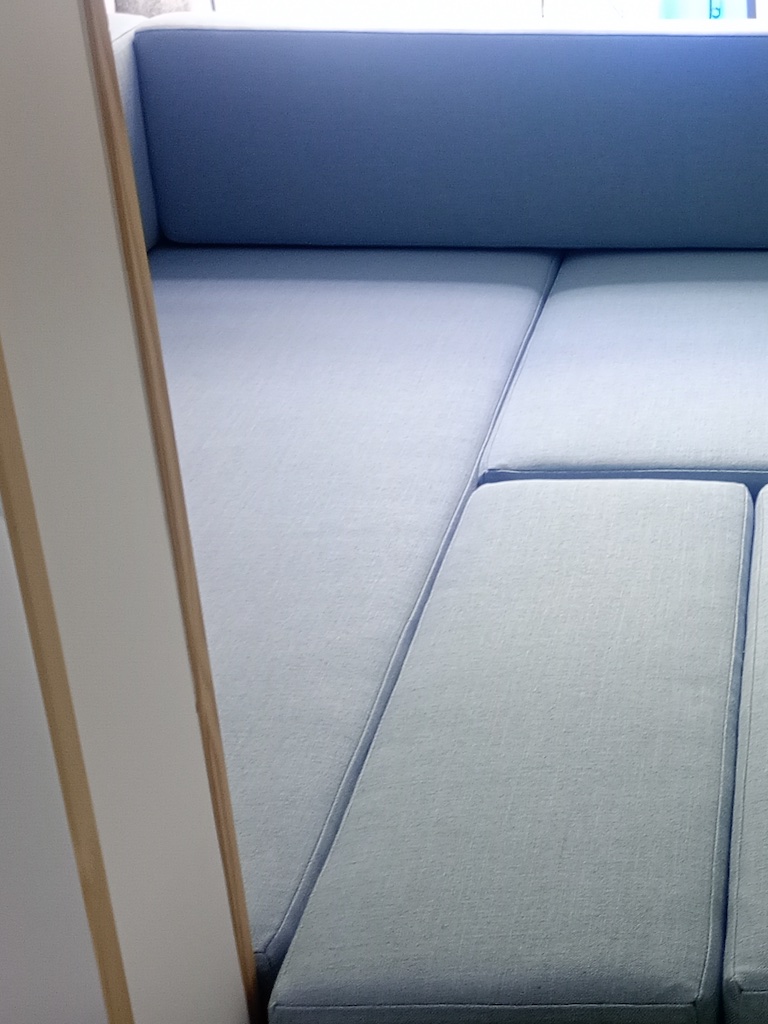 Campervan bed arrangement of cushions covered in Koki Powder from Warwick Fabrics LHS