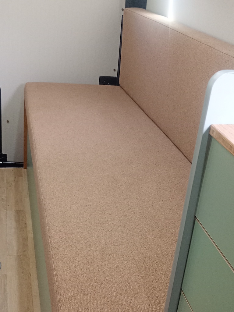 Campervan bench seat arrangement upholstered in soft, durable Cristina Marrone Sonata Tawny RHS
