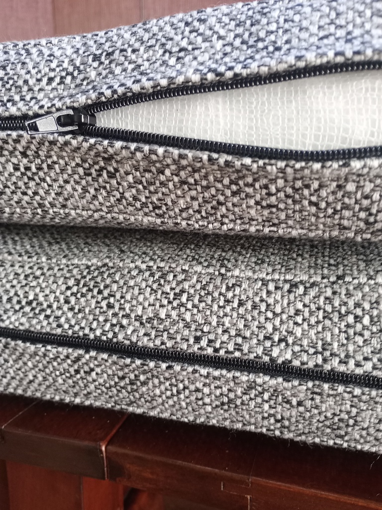 Grey tweed campervan cushion showing the zipper open