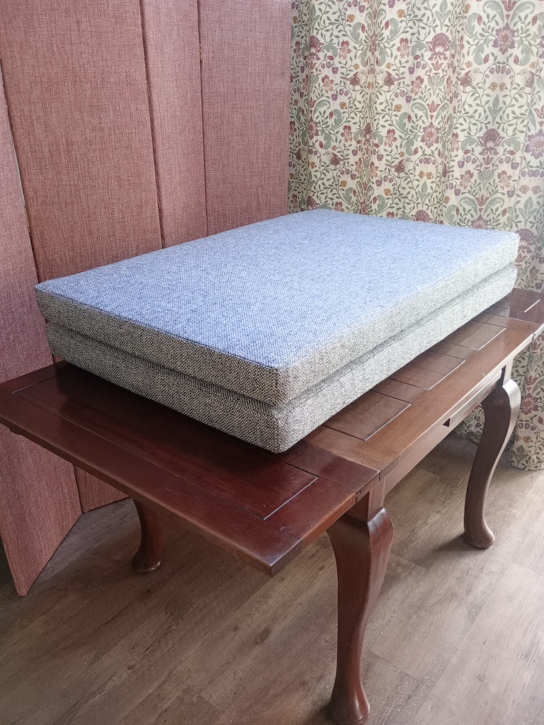 Two grey tweed campervan cushions