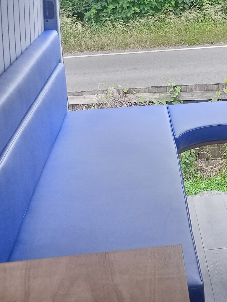 Campervan bench seating arrangement finished in vinyl LHS